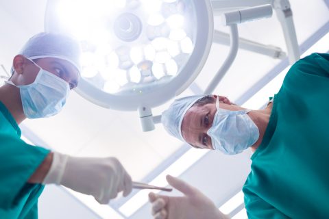 surgeons-operating-in-operation-theater-GHSSPB4